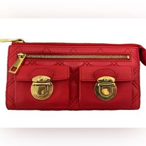 Marc Jacob’s Orange quilted clutch wallet.